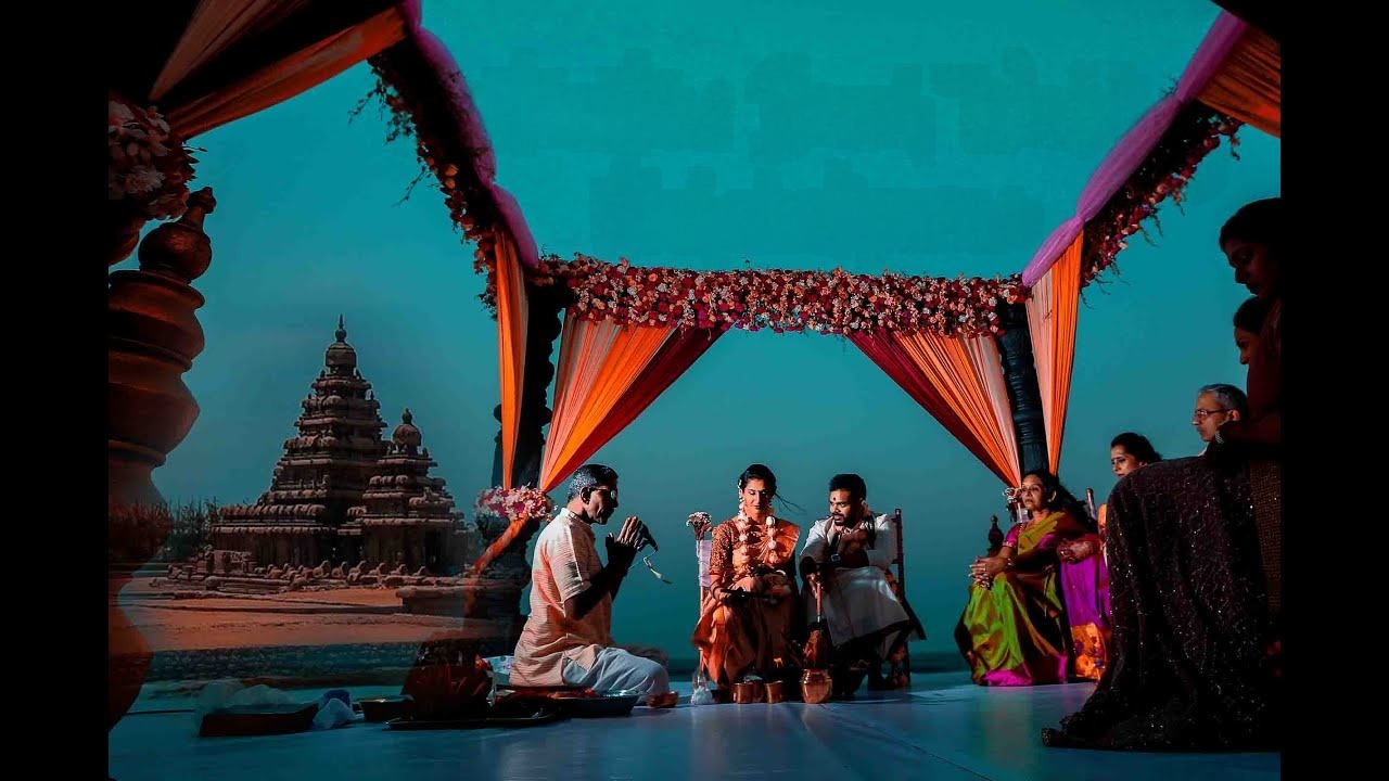 Beautiful beach wedding setup at a luxury resort in Mahabalipuram with ancient temples in the background