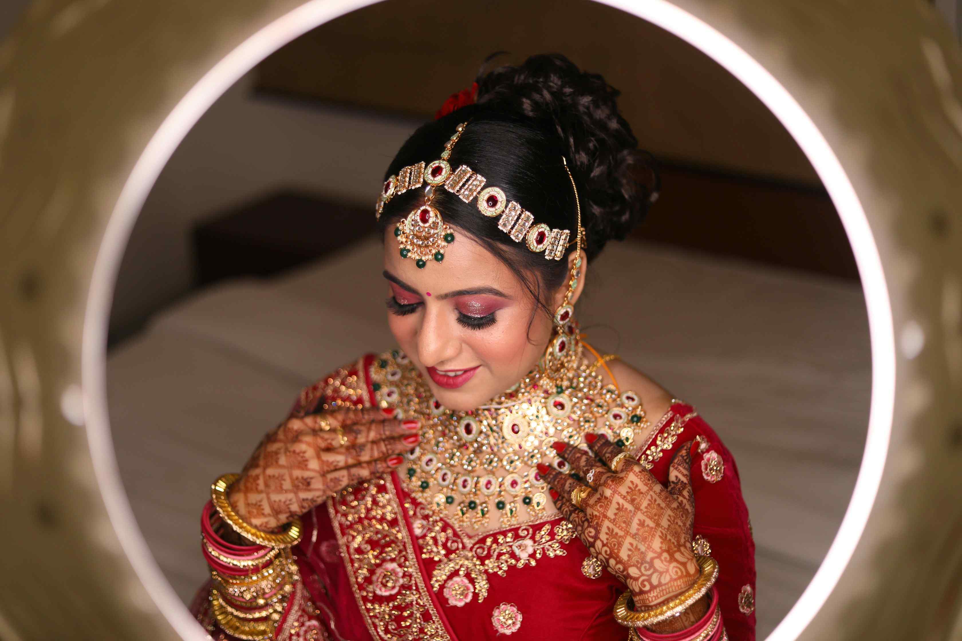Contemporary bridal jewelry collection featuring layered necklaces and statement earrings