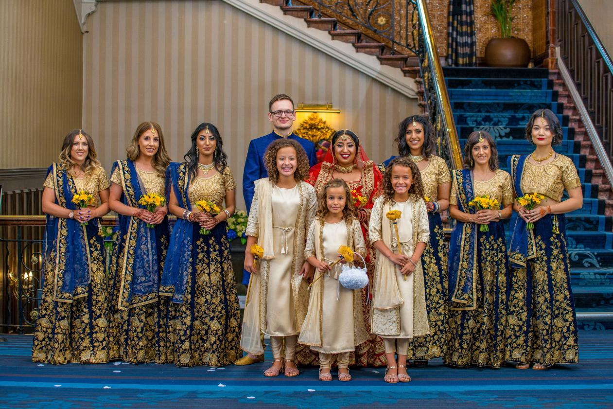 Group of bridesmaids in coordinated Indian wedding outfits showcasing 2026 fashion trends