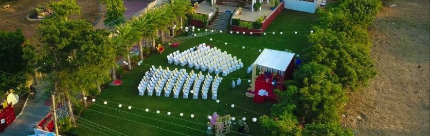 Budget wedding venues for 1500 guests in Chennai decorated with marigold garlands and traditional kolam