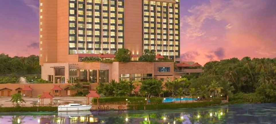 Elegant wedding setup at Crowne Plaza Kochi with backwater views and traditional Kerala decor