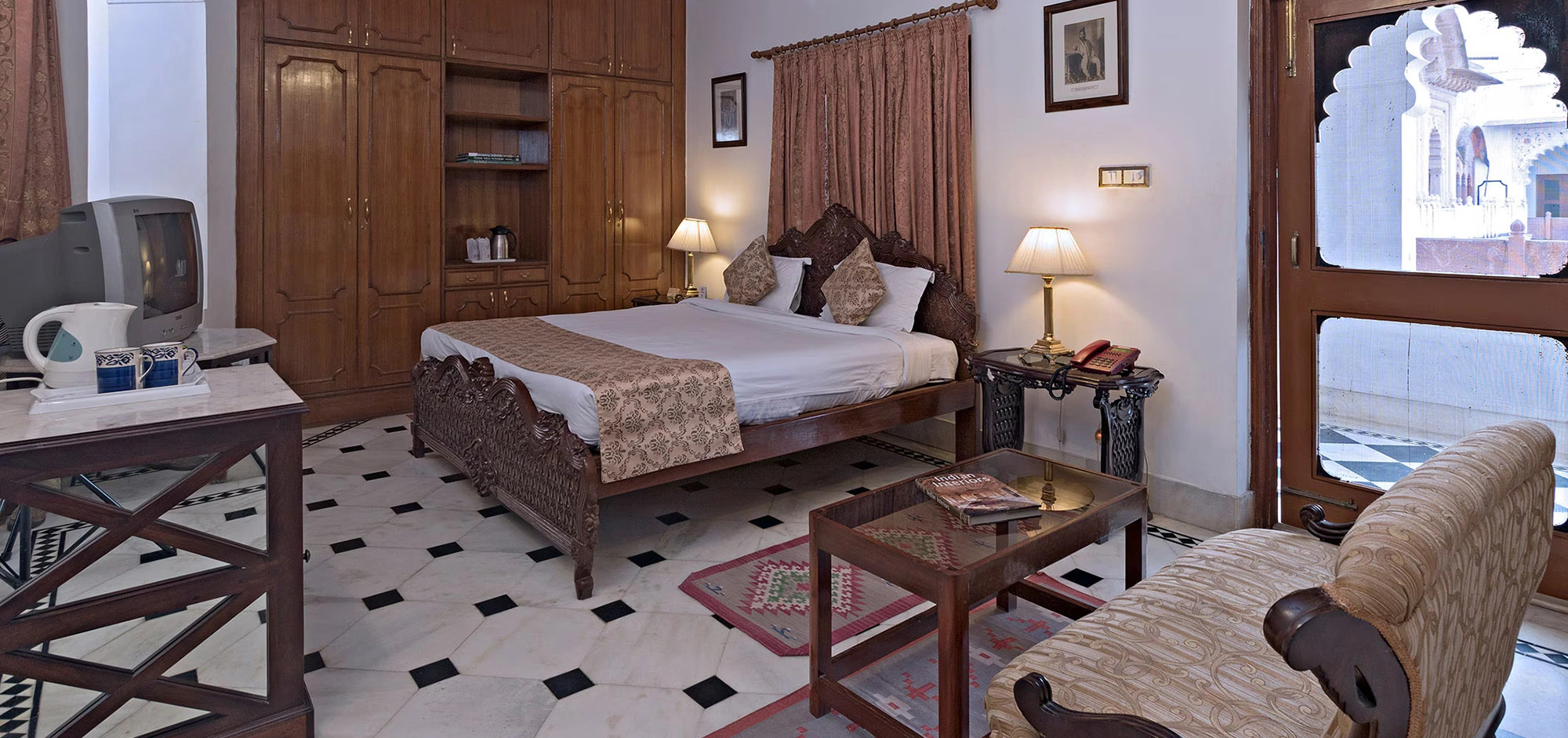 Luxury guest accommodations near Laxmi Vilas with traditional architecture and modern amenities