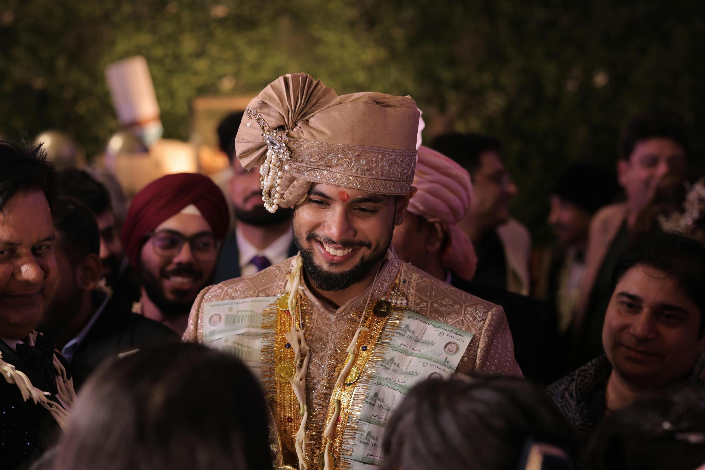 Elegant groom wearing traditional safa turban in vibrant colors for Indian wedding ceremony