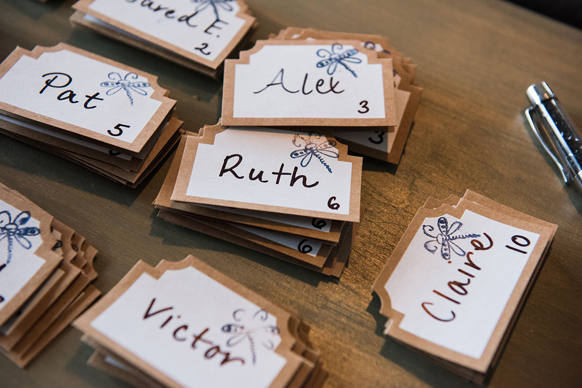 Indian wedding guest list management with traditional decorations and planning materials