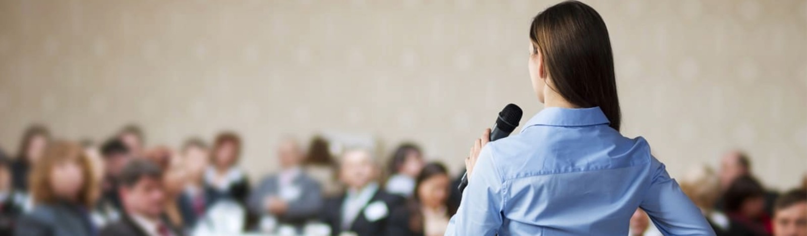 Professional corporate event setup with elegant decorations and networking space