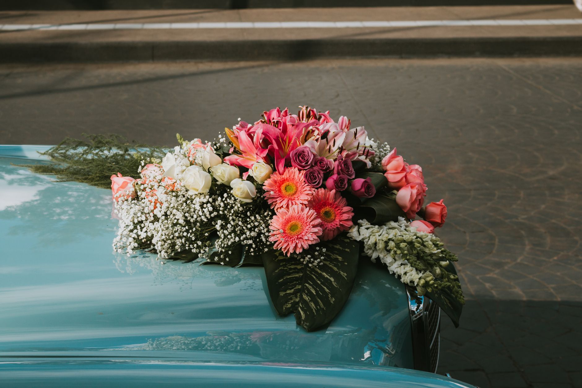 Sacred Blooms for Your Ceremony Car