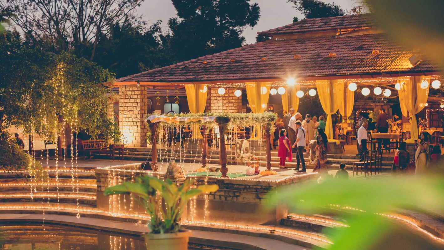 Luxury traditional wedding ceremony at The Tamarind Tree venue with elegant mandap and floral decorations