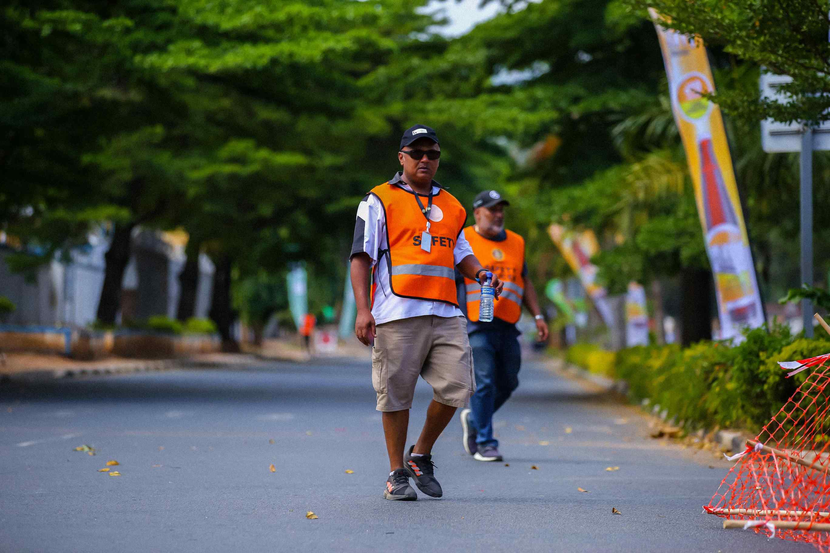 Outdoor event security setup with barriers, monitoring systems, and safety equipment