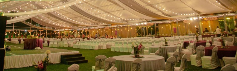 Outdoor wedding venues for 2000 guests in Chennai decorated with marigold mandaps and fairy lights under an open sky