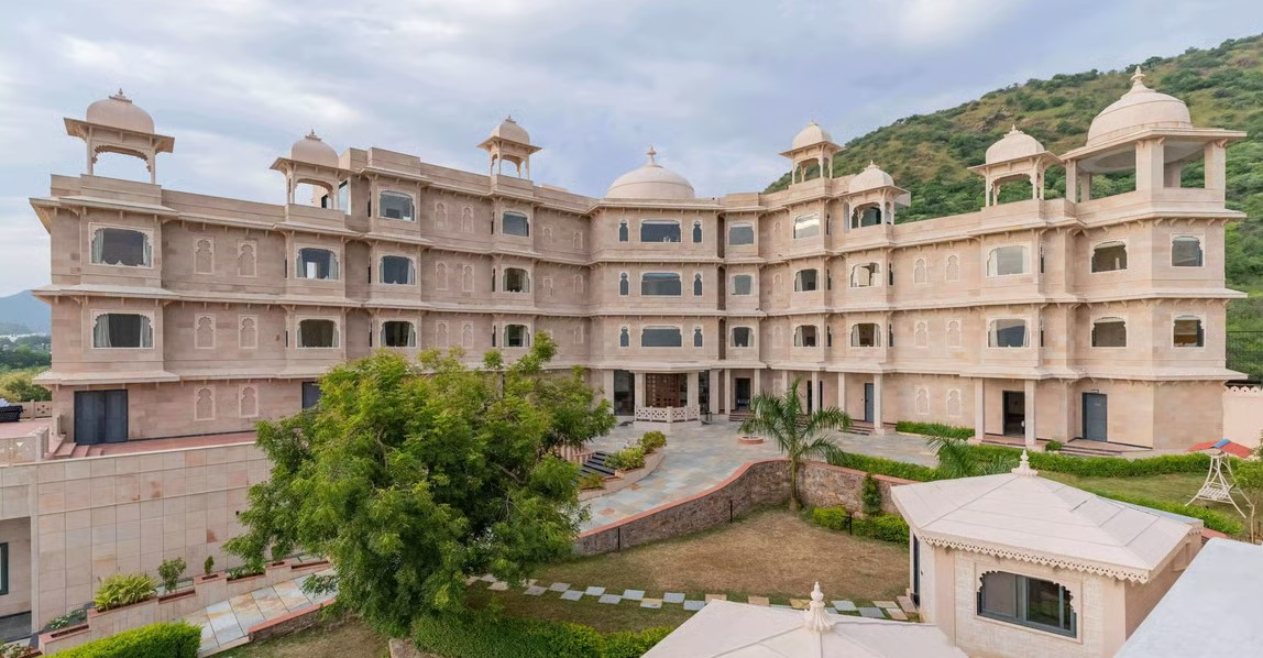Luxurious wedding setup at Traavista Aravali Mahal with traditional Rajasthani architecture