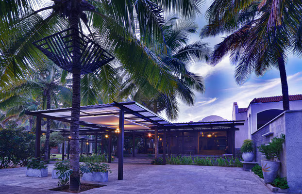 Elegant wedding setup at The Windflower Prakruthi resort with mountain backdrop