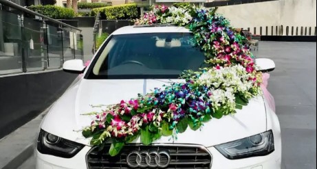 Adorn Your Wedding Car with Royal Blooms