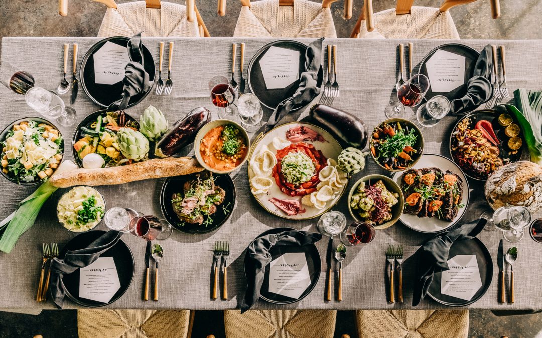 Family-style dishes served on elegant platters for sharing