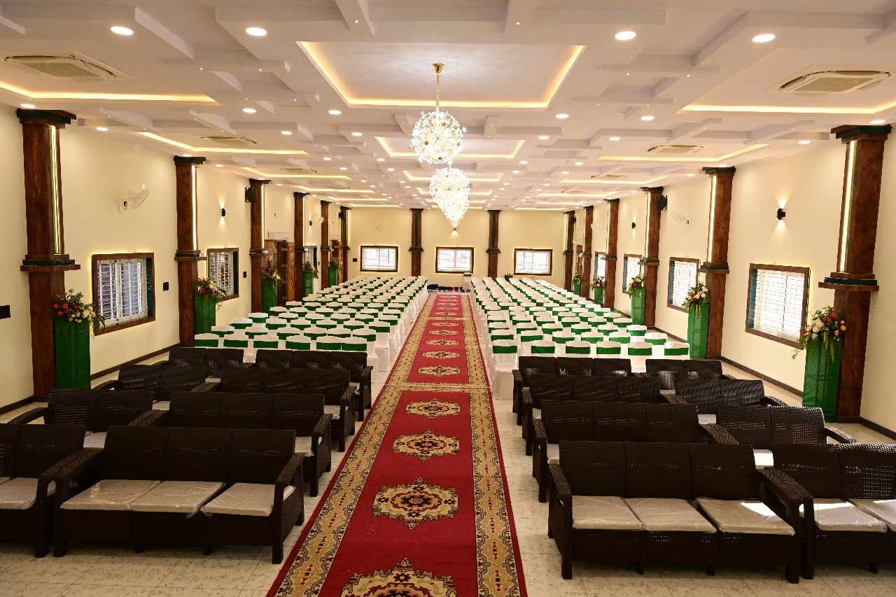 Elegant wedding setup at Srinidhi Convention Center with pink and purple decorations