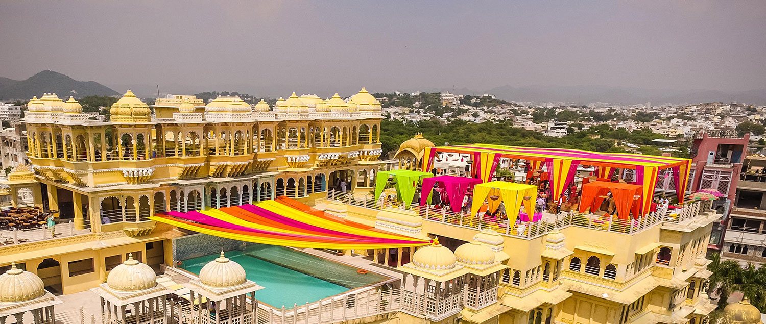 Traditional palace wedding ceremony at Chunda Palace Udaipur with royal decorations and heritage architecture