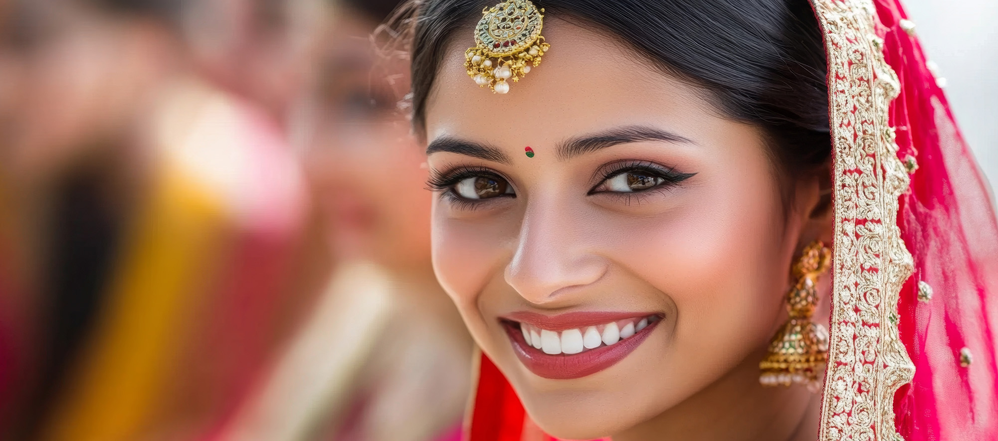 Beautiful Indian bride with glowing acne-free skin applying skincare products in elegant wedding preparation setup