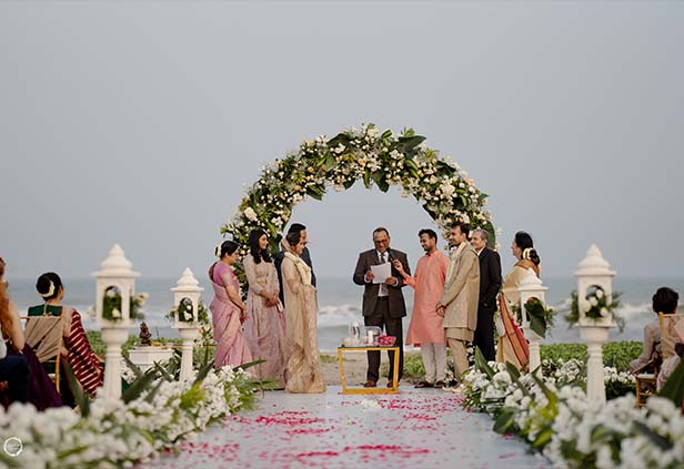 Beach wedding varmala stage with floral decor in Chennai