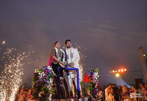 Luxury varmala stage with fireworks during bride and groom entry