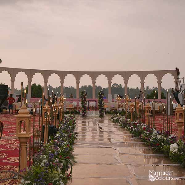 Outdoor wedding aisle decor setup for varmala ceremony