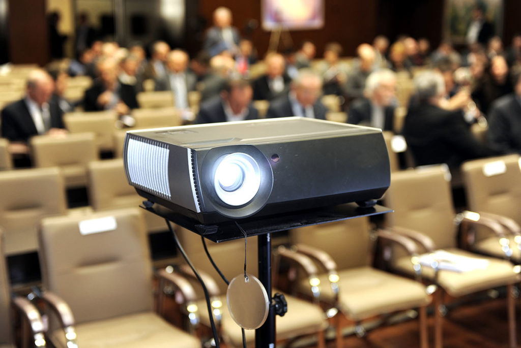 Professional webinar setup showing budget breakdown planning for Chennai events