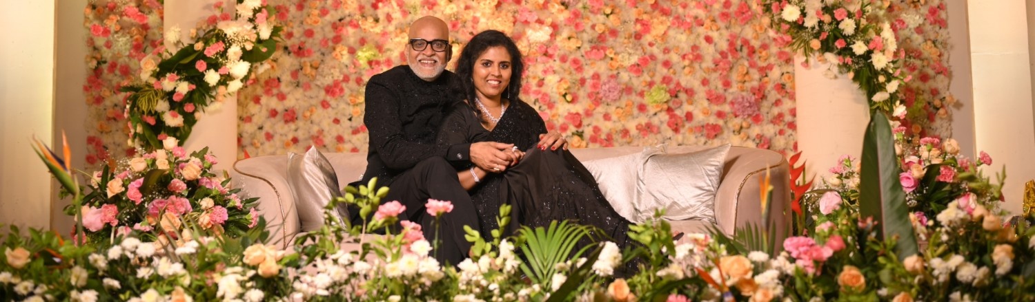 Elegant wedding anniversary celebration setup in Chennai with floral décor and candlelit dinner
