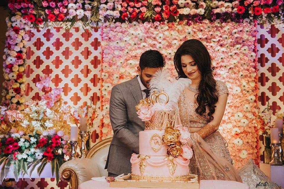 Elegant multi-tier Indian wedding cake with traditional motifs and modern design elements showcasing 2027 trends