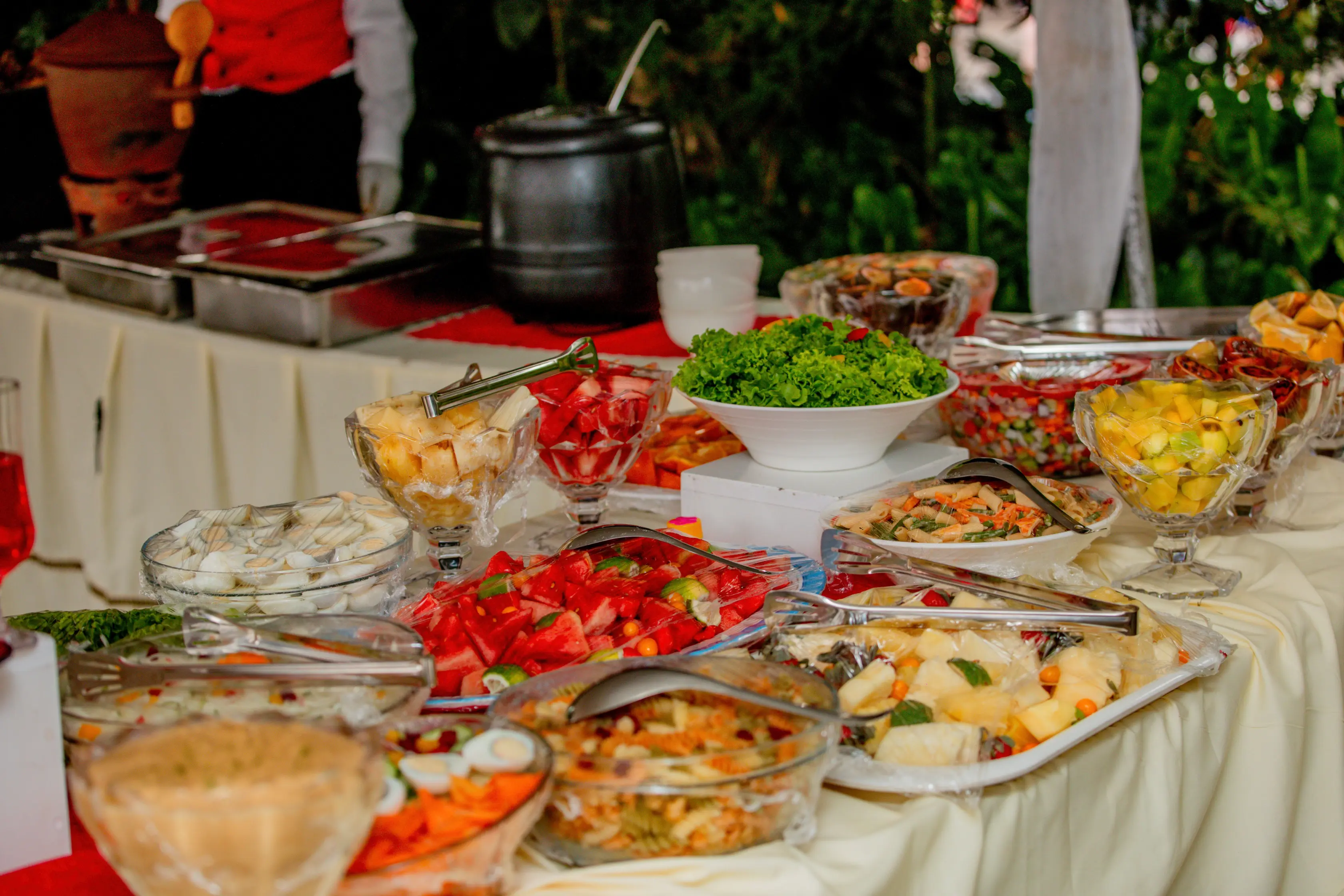 Wedding food experiences showcasing colorful multi-cuisine platters and themed dining setups at Indian celebrations