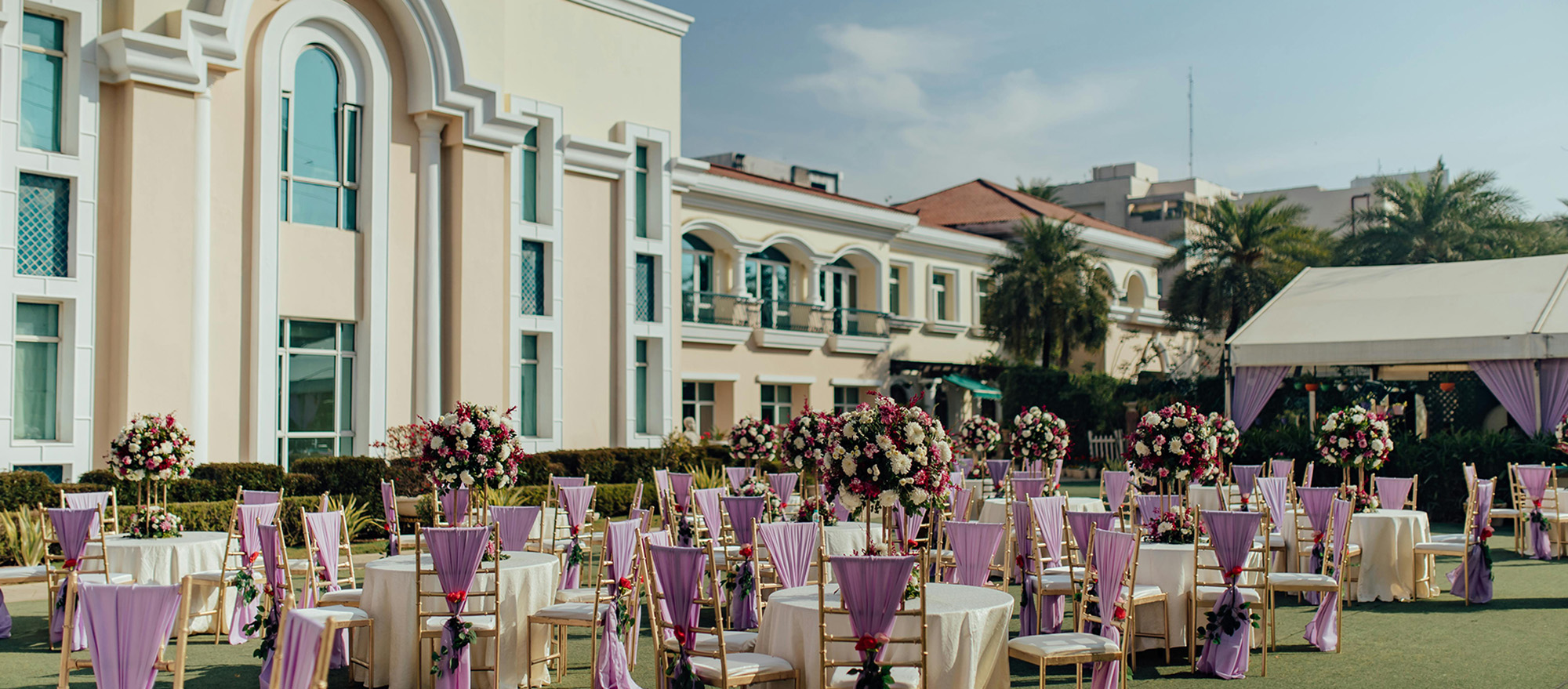 Professional wedding logistics team loading decorative items and equipment into transport vehicles
